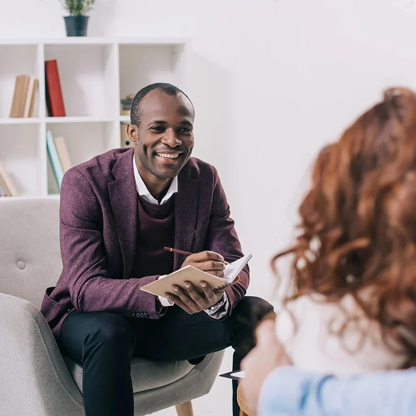 drug-and-alcohol-detox-program-pa Therapist supporting client during addiction detox counseling session in Pennsylvania.