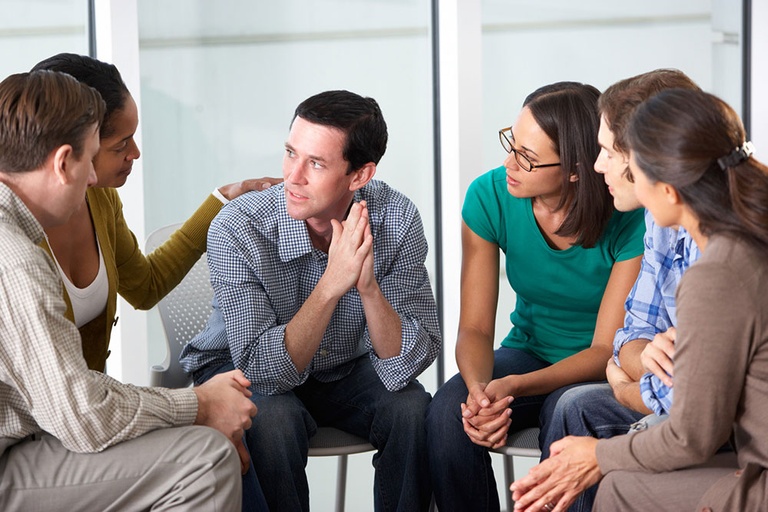 group discussing Common signs and symptoms of drug addiction