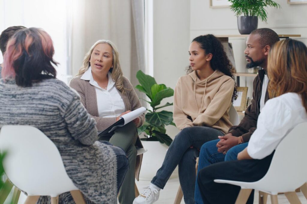 a group of people participate in residential treatment near York