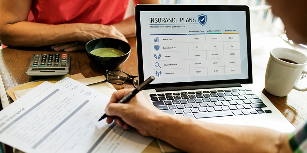a man reviewing insurance plans for cigna rehab